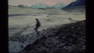Glacier Bay Alaska USA (1977): People With Backpacks Out Hiking Near A Mountain