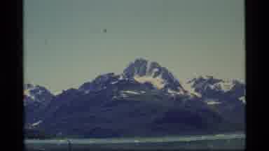 Glacier Bay Alaska USA (1977): Panning Video Of Snow Covered Mountain Tops With