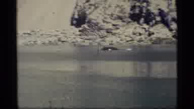 Glacier Bay Alaska USA (1977): Whale Swimming In A Bay Surrounded By Mountains