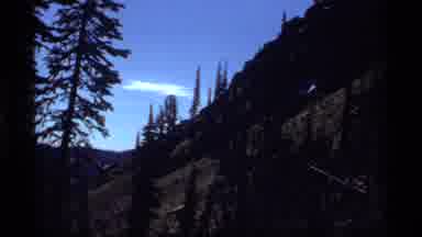 Sapphire Lake Montana USA (1977): Several Hikers Observing Fauna While Navigating