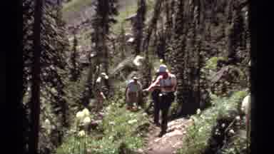 Sapphire Lake Montana USA (1977): A Group Of Hikers Walking Down The Filled