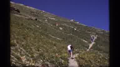 Sapphire Lake Montana USA (1977): People Slowly Hiking Up A Switchback Trail On A