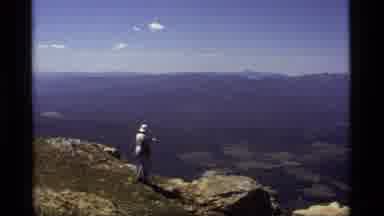Sapphire Lake Montana USA (1977): A Woman Walks To The Edge Of A Mountain And