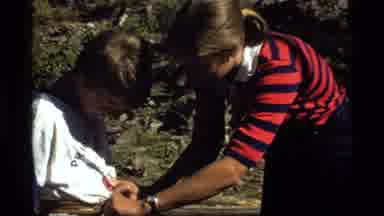 Sapphire Lake Montana USA (1977): Woman Helping Child And River