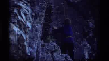Sapphire Lake Montana USA (1977): Young Boy Climbs Rock Wall With A Rope Harness