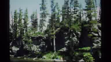 Sapphire Lake Montana USA (1977): Trees In A Mountain Landscape With Wanderer In