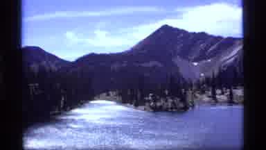 Sapphire Lake Montana USA (1977): Lake Waters Streaming South Away From Mountain
