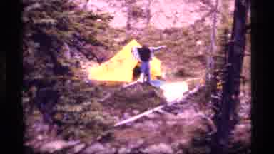 Sapphire Lake Montana USA (1977): A Camper Putting On His Clothes To Get Ready For