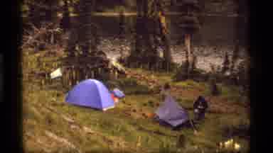 Sapphire Lake Montana USA (1977): A View Of Hikers Camping Out In Wet Snowy