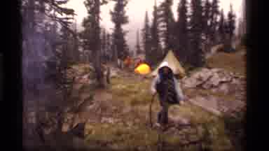 Sapphire Lake Montana USA (1977): Camp In The Forest With Tents And Campfire For