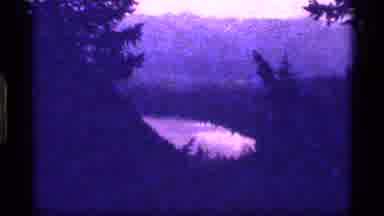 Sapphire Lake Montana USA (1977): Wide Angle Wooded Lake Cuts To Brief Zoom From
