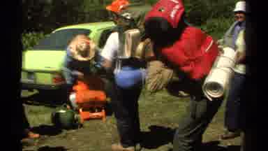 Lake Tahoe California USA (1978): A Group Of People With Backpacks Are Preparing