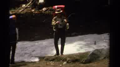 Lake Tahoe California USA (1978): People Wearing Backpacks Throwing Snowballs On A