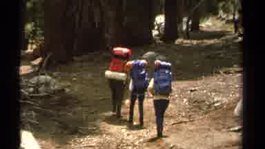 Lake Tahoe California USA (1978): Three People Hiking Up The Mountain To Go