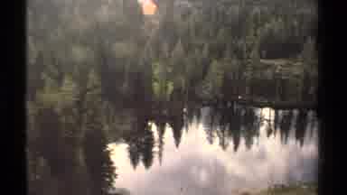 Lake Tahoe California USA (1978): Zooming In On A Tent On The Shore Of A Lake In A