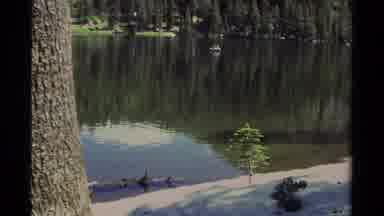 Lake Tahoe California USA (1978): A View Of A Big River And A Man Fishing In A