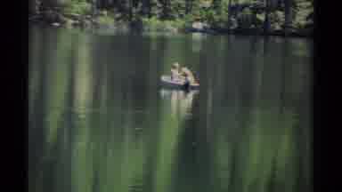 Lake Tahoe California USA (1978): Two People Fishing On The Beautiful Lake Nestled