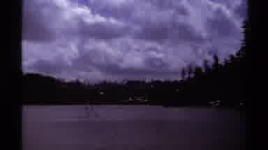 Lake Tahoe California USA (1978): Beach Front With White Clouds In The Sky And