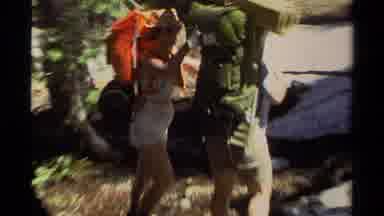 Lake Tahoe California USA-1978: Hikers With Backpacks On Forest Trail