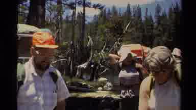 Lake Tahoe California USA (1978): Two People Walking In The Woods About To Go