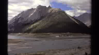 BRITISH COLUMBIA CANADA-1979: Panning Over A Large Mountain Range In The