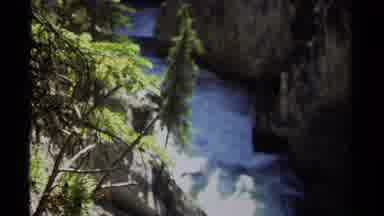 British Columbia Canada (1979): A River Rushing Through A Valley And A Hiking