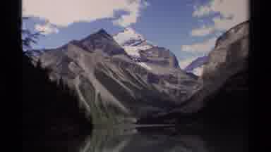 British Columbia Canada (1979): Snowy Mountains And Green Trees Covering The Land