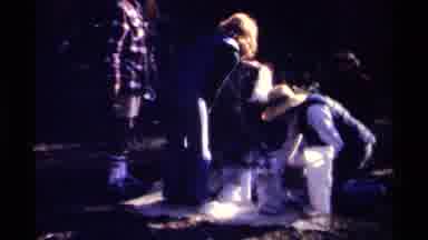 British Columbia Canada (1979): People Holding And Handing Out Bags Of An Unknown
