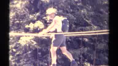 British Columbia Canada (1979): A Person Walking Across A Rope Bridge That Is