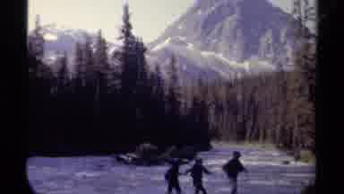British Columbia Canada (1979): Three Young People Crossing A River And Then