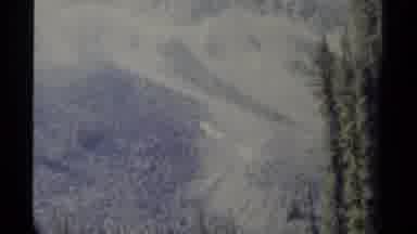 British Columbia Canada (1979): A Couple Of People Hiking By The River On Their