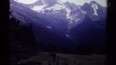 British Columbia Canada (1979): The Mountain Far Ahead With Trees All Around It In