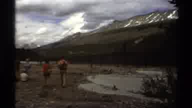 British Columbia Canada (1979): People Walking In Empty Field On A Clear Sunny Day