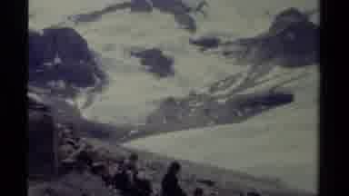 British Columbia Canada (1979): People At The Feet Of The Snowy Alps On A Sunny