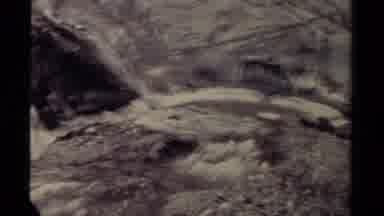 British Columbia Canada-1979: A Turbulent Mountain Stream Flowing Over Jagged Rocks
