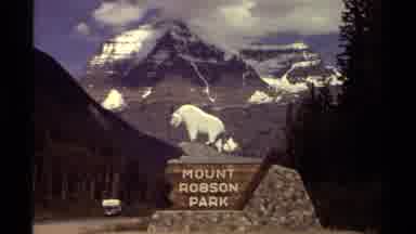 British Columbia Canada (1979): Car Driving Next To Mount Robson Mark And A Shot