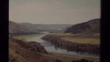 British Columbia Canada (1979): A Zoom In Of A River That Flows Back Into