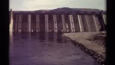 British Columbia Canada (1979): Dam During The Daytime With Still And Quiet Waters