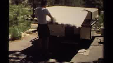 Mendocino California USA (1980): Putting Away A Pop Up Camper In The Daylight