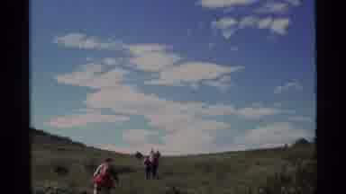 Alaska USA (1977): Group Of People In A Meadow Hike Through Together Besides The