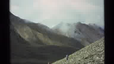 ALASKA USA-1977: Hikers Traverse Fog-Covered Mountain Trail
