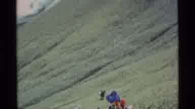 Alaska USA (1977): A A Hiker Resting On A Hill Before Climbing To The Top