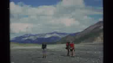 Alaska USA (1977): Montage Of People Hiking With Mountains In The Background Then