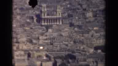 Paris France (1939): Extreme Long Shot Of City Featuring Large Buildings And A