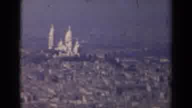 Paris France (1939): Old Film Of Building And Trees With Person Riding Bike