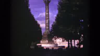 Paris France (1939): People Flock To A Statue Surrounded By Trees On Beautiful Day