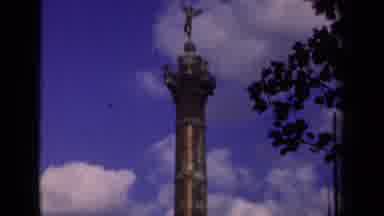 Paris France (1939): Upward Shot Of A Bronze And Pillar-Like Monument With Small