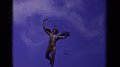 Paris France (1939): Shakey Statue Man With Wings In Blue Sky With Clouds