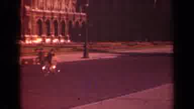 Paris France (1939): People Bicycling Near Ancient Landmark With Statutes Of