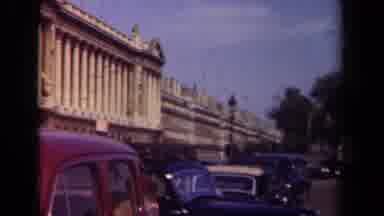 Paris France (1939): Vintage Cars Driving Through Normal City Traffic Near Large